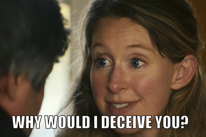 A meme image of a smiling blonde woman with the caption 'WHY WOULD I DECEIVE YOU?' overlaid in white text.