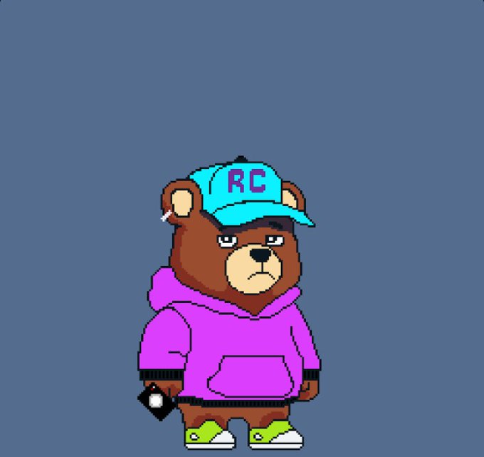The image features a cartoon bear wearing a purple hoodie, blue cap, and green shoes while holding a camera. The caption of the image reads "Thanks for the support @fox_goblin and welcome to the family. RECOVERY IS POSSIBLE #RCVRY". This post is related to the image as it promotes recovery from an illness or injury using the bear's story as inspiration, with the bear being a symbol of hope and resilience in the face of adversity.