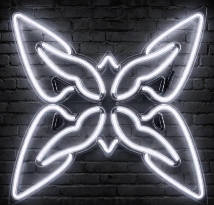A glowing white neon sign shaped like a butterfly mounted on a dark brick wall.