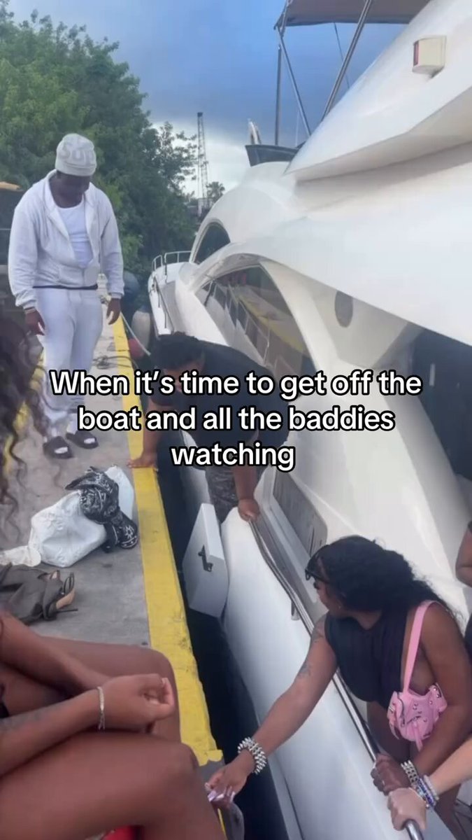 The image shows a man standing next to a boat, with several people gathered around him. One of them is holding onto the side of the boat while another person is reaching out towards the boat's edge. The scene appears to be set on a dock or pier where boats are docked and people are interacting with each other. In the background, there is a car parked nearby.

The post that accompanies this image reads: "saylor selling his bitcoin". This message seems unrelated to the main event in the photo but might have been included as an unrelated comment by someone who tagged the picture or was sharing it on social media.