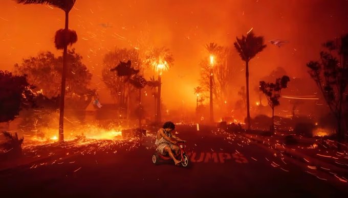 A dramatic digital artwork depicting a person riding a tricycle down a street engulfed in flames and embers, with the word 'TRUMP'S' painted on the road.
