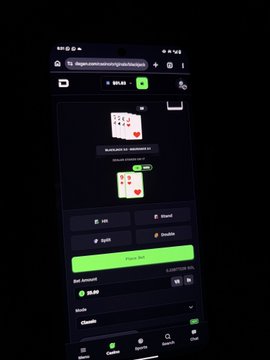 A dark screenshot shows a gambling website with a dice game called 'BURLESQUE VS CHRISTMAS' featuring odds and betting controls on a mobile interface.