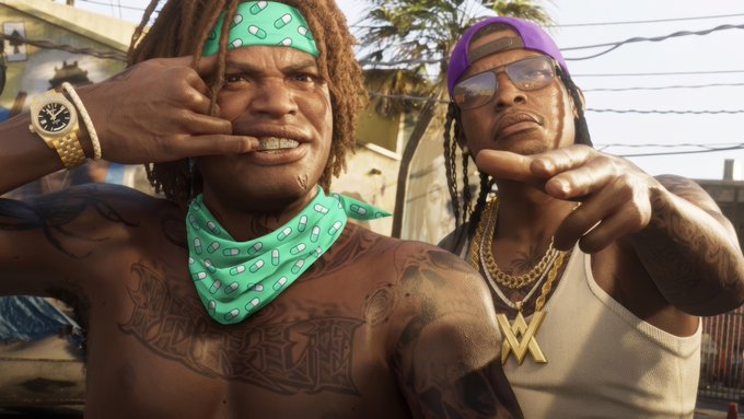 Two men pose aggressively for the camera; one wears a green bandana and has gold grillz and tattoos, while the other wears a purple cap, sunglasses, and a gold chain.