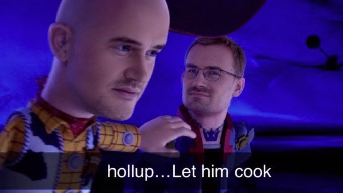 The image is a meme featuring Toy Story's Woody and Buzz Lightyear characters, but with AI-generated faces of two real men (likely stock traders) pasted onto their bodies, set against a blue-lit background. The caption reads "hollup....Let him cook," which aligns with the post's "base is cookin'" phrase—both referencing crypto/meme stock traders telling others to wait patiently while a price base is being built before a major rally.