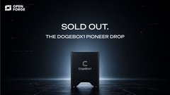 The image features an advertisement for a new product, specifically a DogeBox1, which is a type of computer hard drive. The background of the image is dark, with a spotlight shining down on the DogeBox1, making it stand out prominently against the darkness. The text in the image reads "Sold Out", indicating that the product has been purchased by someone and is now available for purchase to others who are interested.