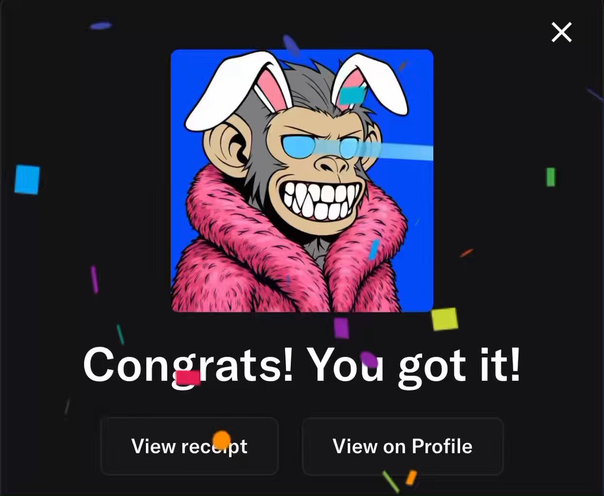 The image features a cartoon monkey wearing a pink fur coat, with white rabbit ears and a blue hat. The monkey appears to be smiling and has a surprised expression as if something unexpected happened. The background of the image is black, which contrasts with the colorful elements in the foreground. There are also small pieces of confetti scattered throughout the scene, adding to the festive atmosphere.
