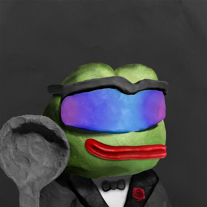 A 3D-rendered cartoon character resembling a green frog or Pepe wearing reflective sunglasses and a tuxedo with a red rose lapel pin.