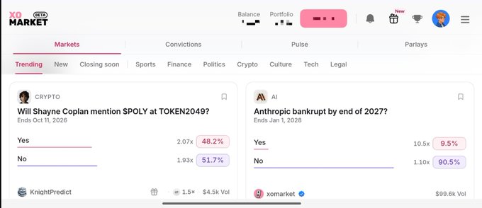 A screenshot of the XO Market prediction platform displaying trending markets, including 'Will Shayne Coplan mention $POLY to TOKEN2049?' and 'Anthropic bankrupt by end of 2027?'.