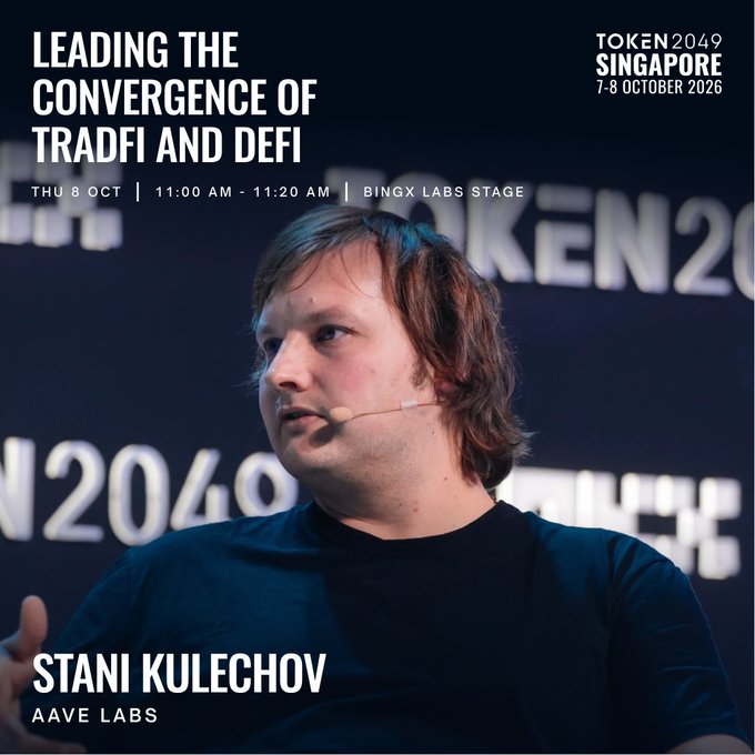 The promotional image announces Stani Kulechov of Aave Labs speaking on the topic "Leading the Convergence of TradFi and DeFi" at the TOKEN2049 Singapore conference on Thursday, October 8, from 11:00–11:20 AM on the BingX Labs Stage, alongside host andyyy (The Rollup). It features a close-up of Kulechov wearing a headset microphone against a backdrop displaying the event branding, directly illustrating the speaking session described in the post.