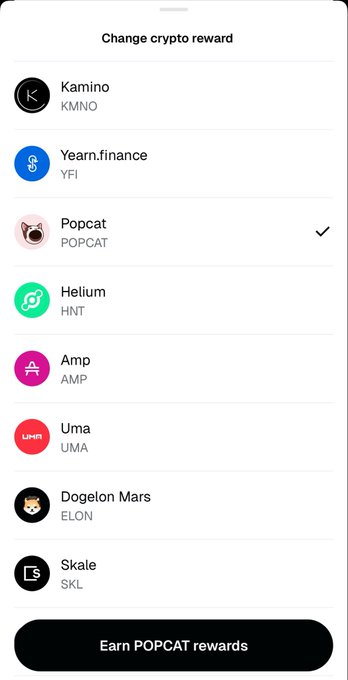 A Gemini "Change crypto reward" screen displays a list of tokens including Kamino (KMNO), Yearn.finance (YFI), Popcat (POPCAT) — which is selected with a checkmark — Helium (HNT), Amp (AMP), Uma (UMA), Dogelon Mars (ELON), and Skale (SKL), with an "Earn POPCAT rewards" button at the bottom. The image illustrates the post's claim of switching Gemini staking rewards from Solana to POPCAT as part of a "cat coin supercycle."