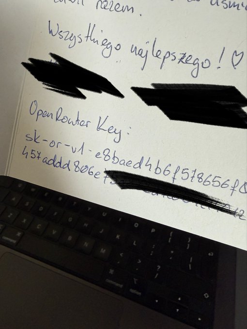 A handwritten wedding card in Polish ("Wszystkiego najlepszego!" with a heart, meaning "All the best!") reads "OpenRouter key" followed by an alphanumeric string (partially redacted with black marker) starting with "sk-or-v1-e8baed4b6f5186567" and including "45Xadd8ebe72...ed3aa8d2." The image shows the card resting on a laptop keyboard, illustrating the post about receiving an OpenRouter API key as an unexpected wedding gift.