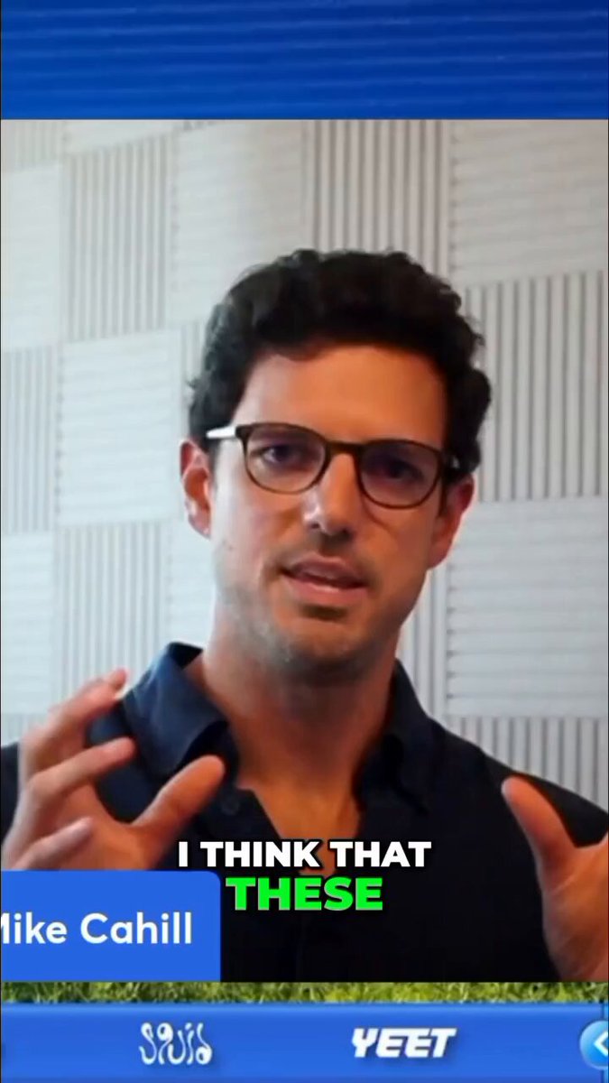 The image shows a man wearing glasses giving a speech or presentation with his hands outstretched as if he's making an important point. The caption below the image reads "I Think That These Predictions Markets Are Slowly Turning into One of the Most Important Layers of the Internet Economy".