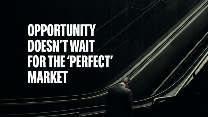 A man in a suit rides an escalator in a dark, modern setting alongside bold white text reading "OPPORTUNITY DOESN'T WAIT FOR THE 'PERFECT' MARKET," reinforcing the post's message urging immediate action to join the Summer Portfolio Challenge before the chance passes.