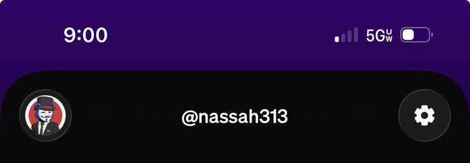The image shows a mobile phone screen displaying the time as 9:00 with 5G signal and a low battery, alongside a dark interface featuring a profile labeled "@nassah313" with a settings gear icon. This appears to be a joke about the poster needing a new phone battery (or device) funded by MoonPay, matching the tweet's request for a generous intern to "hook them up."