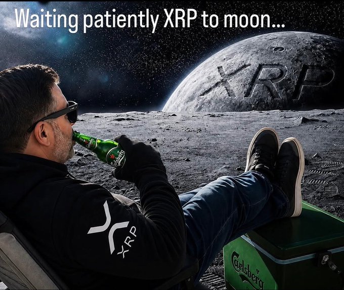 A man in a black "XRP" hoodie relaxes on a green Carlsberg cooler on the moon, casually drinking a beer while gazing at a lunar surface emblazoned with "XRP" beneath the caption "Waiting patiently XRP to moon..."—visually embodying the post's message of calm, patient accumulation while others panic-sell.
