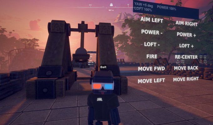A video game screenshot showing a character named 'Balt' with 3D glasses standing before a catapult structure, with on-screen controls for aim, power, loft, fire, and movement.
