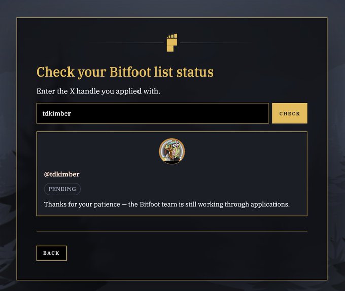 A webpage interface titled 'Check your Bitfoot list status' showing a pending application for the X handle 'tdkimber', with the message 'Thanks for your patience - the Bitfoot team is still working through applications.'