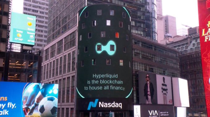 A view of the Nasdaq billboard in Times Square displaying a cyan logo and the text 'Hyperliquid is the blockchain to house all finance' next to the Nasdaq logo.