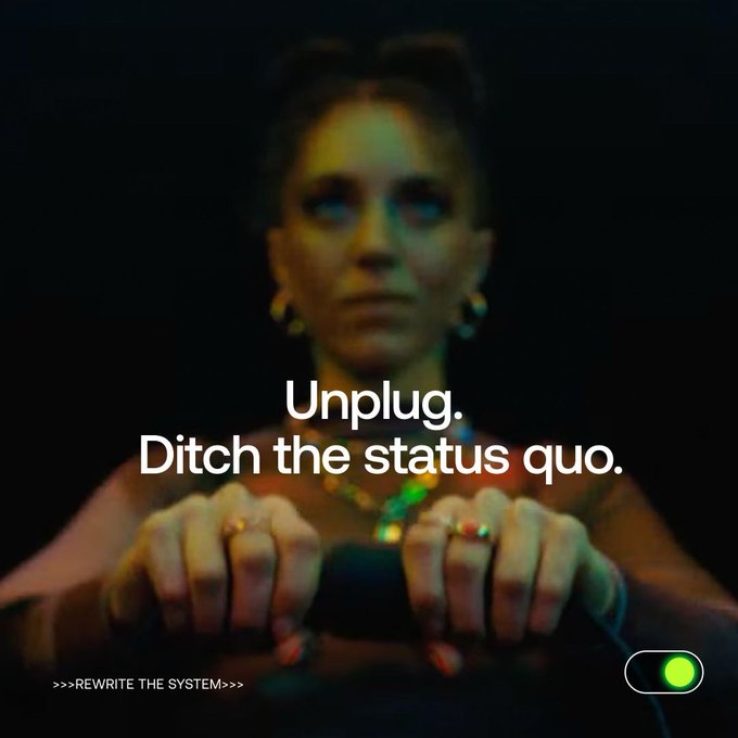 The image shows a woman in dim lighting gripping what appears to be a device or cable, overlaid with the text "Unplug. Ditch the status quo." along with a toggle switch graphic and the phrase ">>>REWRITE THE SYSTEM>>>". The "unplug" theme visually reinforces the post's message about leaving traditional finance (TradFi) behind and rewriting the system.