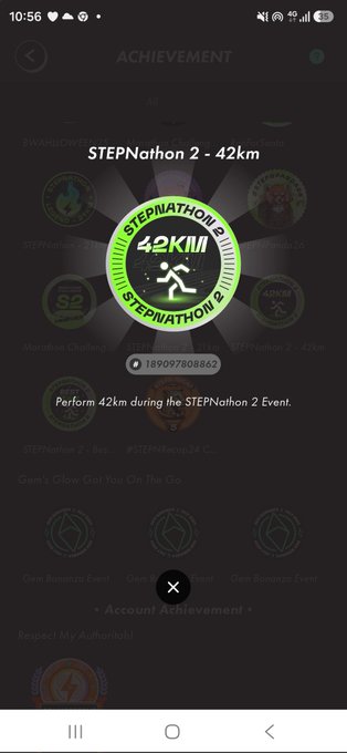The image shows a STEPN achievement screen displaying a "STEPNathon 2 - 42km" badge with the text "Perform 42km during the STEPNathon 2 Event" and a serial number. This relates to the post where the user celebrates finally receiving their OG (Original) badge and background after completing the STEPNathon 2 challenge just before the deadline, thanking community champions who advocated with the support team.