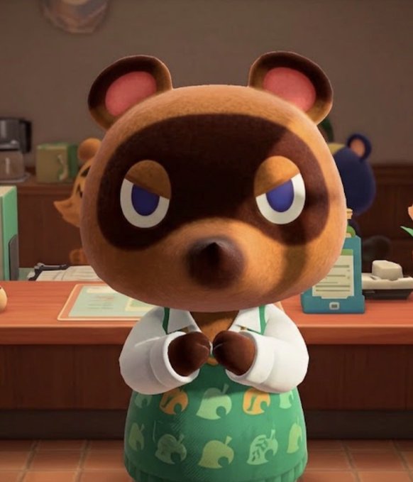 Tom Nook, the tanuki character from Animal Crossing, stands behind a shop counter wearing a green apron with leaf patterns, looking annoyed with half-lidded eyes and his paws clasped together.