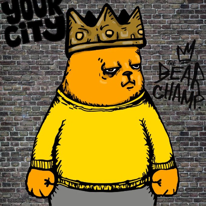 A cartoon orange bear wearing a yellow sweater and a gold crown stands against a brick wall tagged with "YOUR CITY" and "THE BEAR CHAMP" graffiti, visually embodying the $BCHAMP meme token referenced in the post.