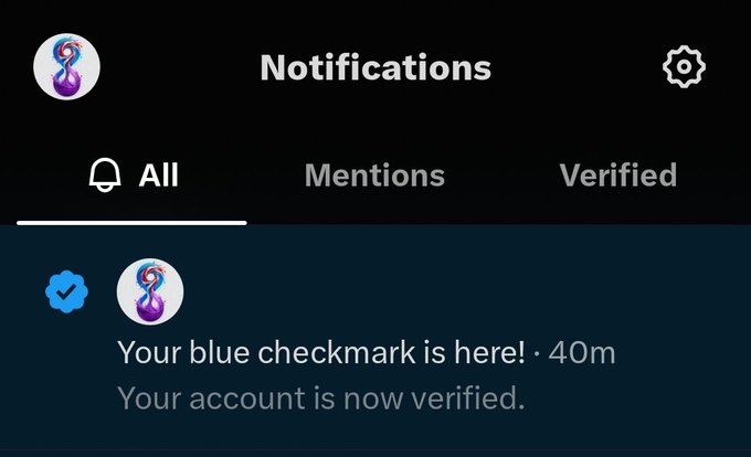 A Twitter/X notifications screen displaying a message: 'Your blue checkmark is here! · 40m Your account is now verified.'