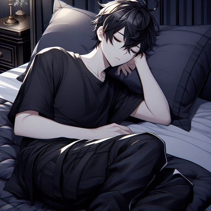 Anime-style illustration of a young man with messy dark hair sleeping peacefully in bed, wearing a black t-shirt and dark pants, with soft lighting on a nightstand beside him.