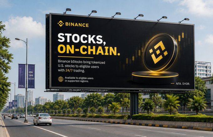 A large billboard on a city street advertises 'BINANCE' with the text 'STOCKS, ON-CHAIN.' mentioning tokenized U.S. stocks and 24/7 trading.