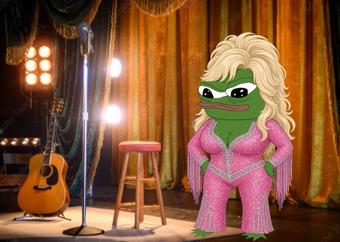 A stock photo-style image shows a green Pepe the Frog character edited with long blonde hair and a pink sequined Dolly Parton-style jumpsuit with fringe, standing on a stage with a microphone, stool, guitar, and curtains in the background.