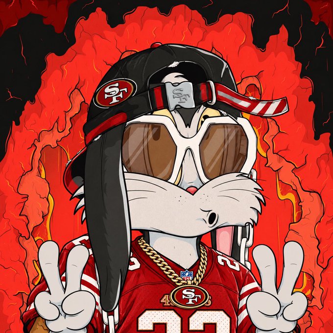 A cartoon rabbit dressed in San Francisco 49ers gear, including a black cap with the "SF" logo, sunglasses, a gold chain, and a red jersey with "49ERS", makes peace signs with both hands against a background of red flames.