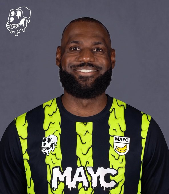 A portrait of LeBron James wearing a black and neon green MAYC (Mutant Ape Yacht Club) jersey featuring a skull logo and MAFC patch.