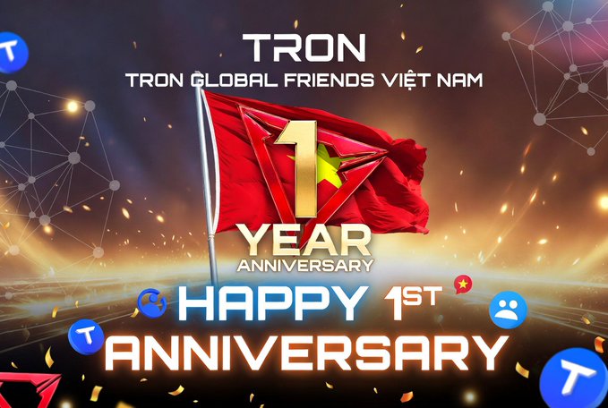 The image features a red flag with the number 1 on it, surrounded by confetti. The background of the image shows fireworks, indicating that this event might be related to an anniversary celebration or some other special occasion.