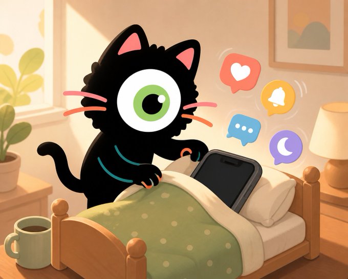A cartoon illustration of a black cat with one large green eye, wearing a teal collar, sitting on a bed and looking at a smartphone with social media notification icons (heart, bell, message, moon) floating above it.