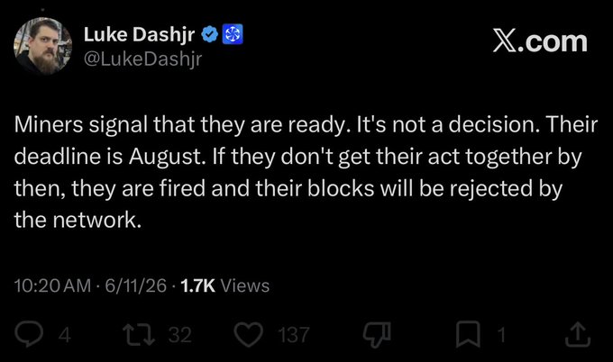 The image shows a black background with white text that reads "Miner's signal that they are ready, it's not a decision. Their deadline is August. If they don't get their act together by then, they are fired and their blocks will be rejected by the network." The post appears to be a response to an email or message from someone named Luke Dashir, who has tweeted about this issue.