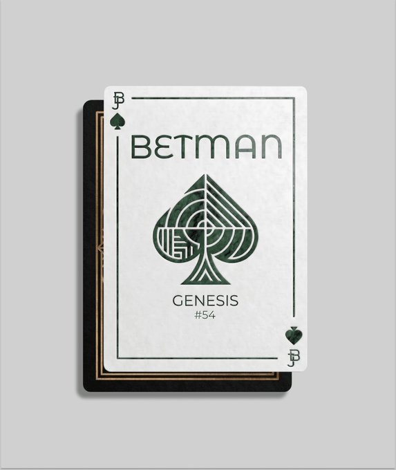 A stylized playing card design featuring a dark green spade with 'BETMAN' and 'GENESIS #54' text on a white card against a black backing.