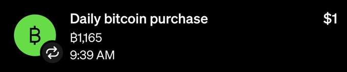 A mobile app notification for a 'Daily bitcoin purchase' showing a balance of ₿1,165 purchased at 9:39 AM, displayed with a green Bitcoin Cash logo.
