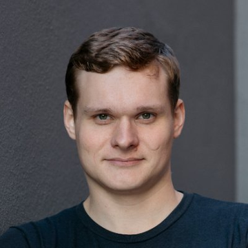 A headshot portrait of Illia Polosukhin, co-founder of NEAR Protocol, who has proposed establishing a protocol sovereign fund to provide long-term financial support for public goods within the NEAR ecosystem, including network security.