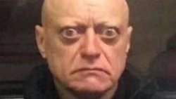 A bald man with wide, startled eyes and a worried expression conveys shock or disbelief. The image humorously reflects the post's sentiment of being unable to analyze fresh Robinhood crypto wallets, expressing frustration at the lack of tools to determine if the coins are bundled.