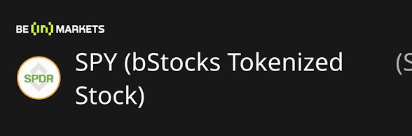 The image shows a Be[in]Crypto Markets listing for "SPY (bStocks Tokenized Stock)" displayed in white text next to a green and orange SPY ETF logo on a black background. The graphic highlights the tokenized version of the SPY ETF, which mirrors the post's description of SPYb as a 1:1 backed, on-chain representation of the S&P 500 index on BNB Chain.