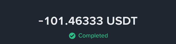 A dark screen displays a completed transaction showing '-101.46333 USDT' with a green checkmark.