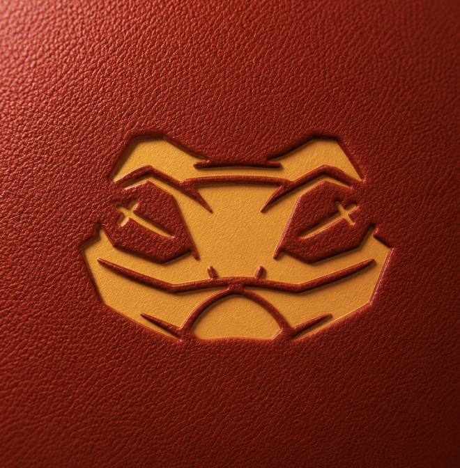 !"ff'ing" is a logo that has been used by multiple brands, including Solana. It consists of an orange circle with a yellow line through it, which is often associated with the cryptocurrency Ripple. The image shows a close-up view of this logo on a red background.