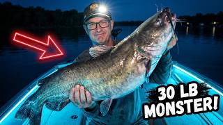 The image features a man holding up a large fish, possibly a monster fish, while wearing glasses and a hat. The photo has been edited with a red arrow pointing towards the fish, indicating that this is an important moment captured for sharing on social media platforms like Instagram or Facebook.