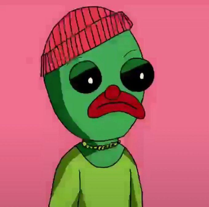 A sad green cartoon character with a red beanie and downturned red lips appears against a pink background, reflecting a melancholic "sad Pepe" vibe. The image accompanies a giveaway promotion for OZZ GENESIS NFTs on the OZZLAB ecosystem, with the character's expression conveying a longing or FOMO mood often used in meme-style crypto posts.