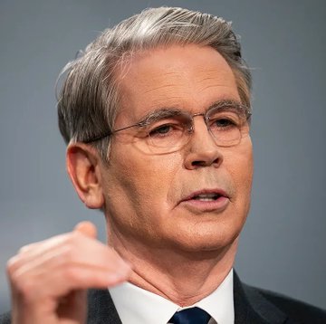 The image shows Treasury Secretary Scott Bessent speaking, which relates to the accompanying news about his strong urging for the Senate to pass the Clarity Act to maintain U.S. leadership in digital assets.