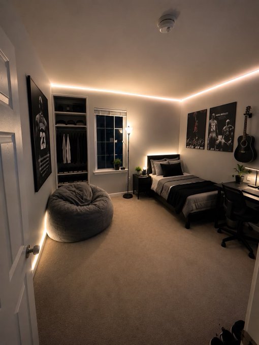 A modern bedroom with LED strip lighting, featuring a single bed, a gray bean bag chair, a closet, basketball and music posters on the walls, and a guitar.