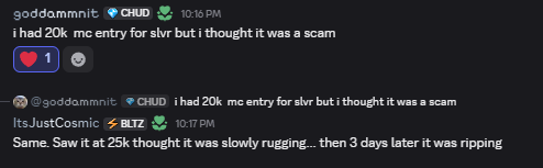 A Discord chat where user "goddammit" claims to have made a 20k MC entry for $slvr believing it was a scam, and "ItsJustCosmic" responds about seeing it at 25k thinking it was lagging before it pumped.