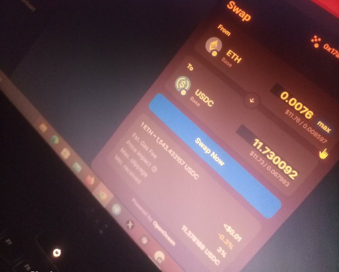 A close-up photo of a smartphone screen displaying a crypto swap interface where 0.0076 ETH is being converted to 11.730092 USDC, with an estimated gas fee of $0.01 and 0.3% slippage. The image illustrates the post's point about practical Web3 utility, showing a user actively performing a real swap on DustswapOnBase rather than chasing hype.