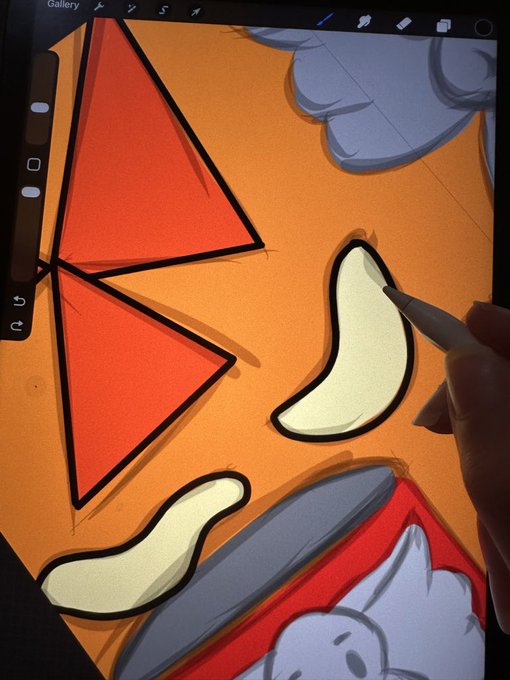 Digital drawing in progress on a tablet screen showing a cartoon character with red triangular ears and orange background, with a hand using a stylus to draw.