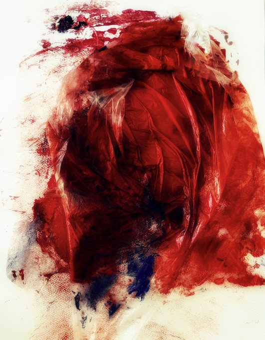 An abstract painting featuring rich, textured layers of deep red and crimson paint with hints of blue, creating a draped, fabric-like appearance on a white background.